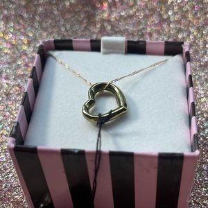 14K gold necklace with a green heart.